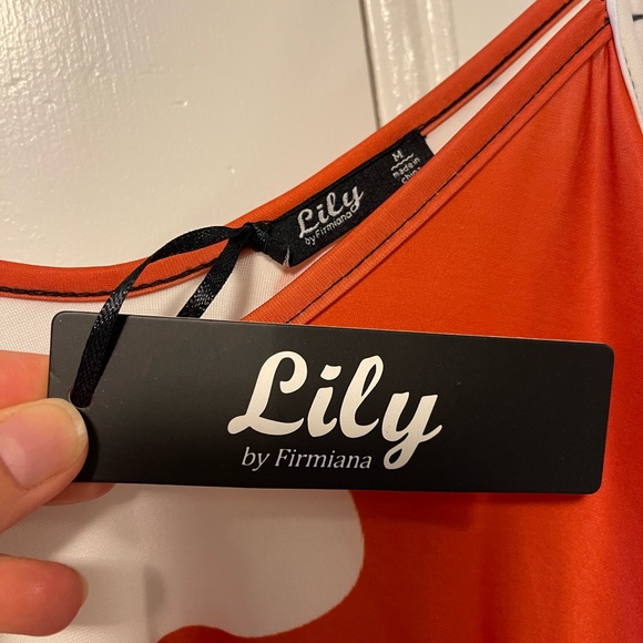 Soft polyester jumpsuit with side pockets, relaxed fit. New - Picture 4 of 6